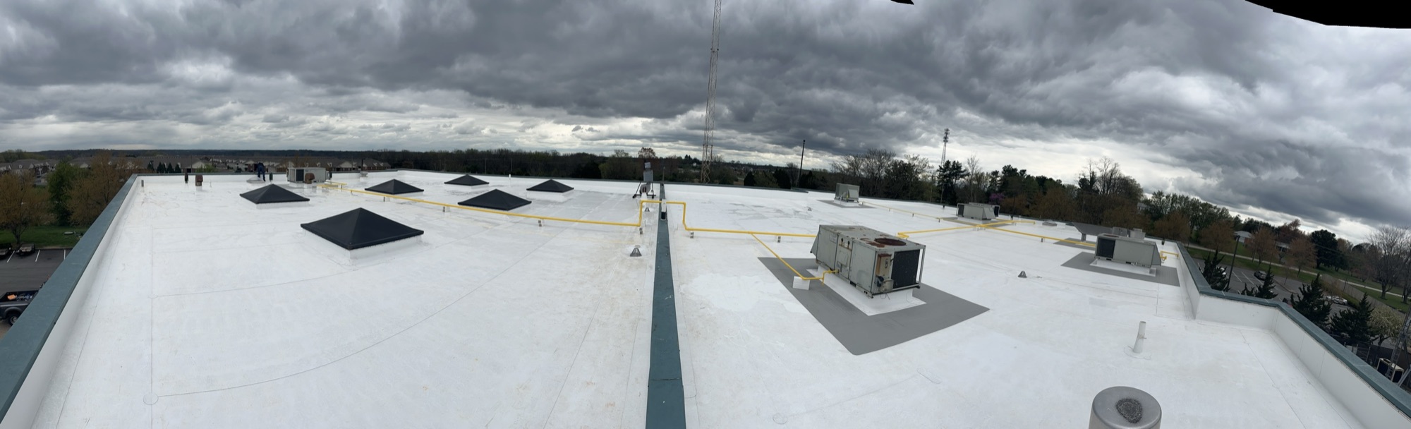Panoramic view of a finished fluid-applied roof field